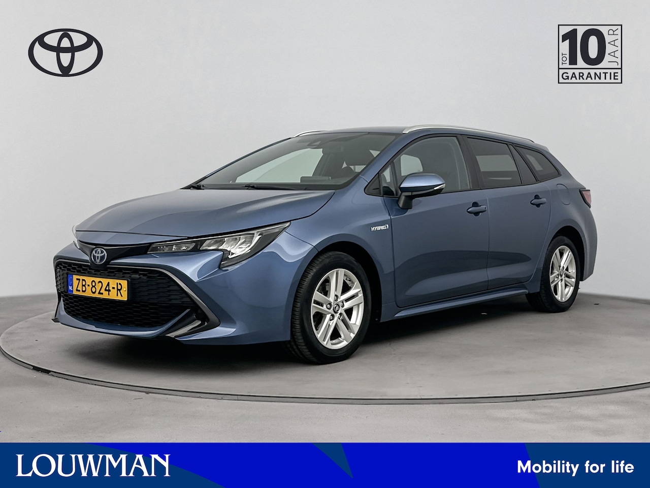 Toyota Corolla Touring Sports - 1.8 Hybrid Active | Navigatie | LM velgen | Climate Control | - AutoWereld.nl