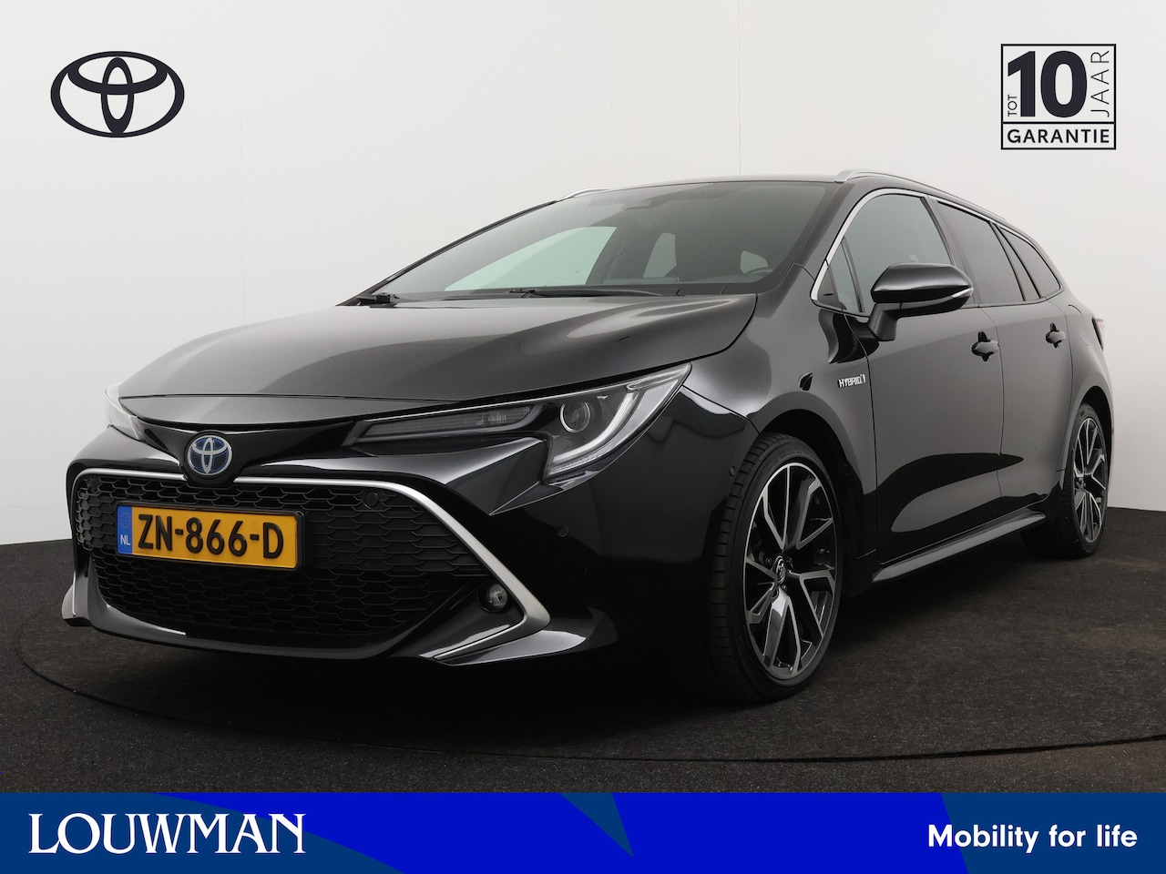 Toyota Corolla Touring Sports - 2.0 Hybrid Executive | Navigatie | Camera | LM velgen | Stoelverwarming | Draadloze telefo - AutoWereld.nl