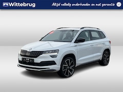 Skoda Karoq - 1.5 TSI ACT 150pk DSG Sportline / 19"LMV / APP.Connect / CAMERA / PANODAK / Full LED / Sto