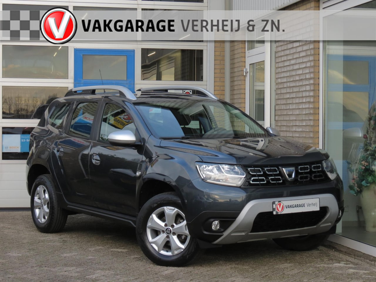 Dacia Duster - 1.0 TCe Comfort DAB+|Cruise|Airco|Lichtmetaal|Dak Rails - AutoWereld.nl