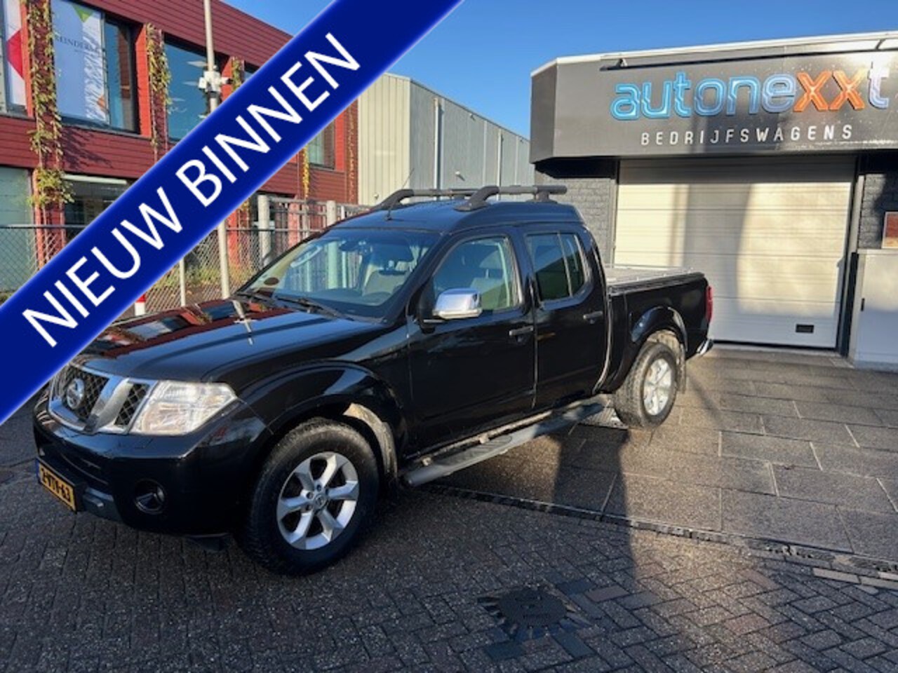 Nissan Navara - 2.5 dCi LE Double Cab 4X4 I AIRCO I NAVIGATIE I TREKHAAK I 5 PERSOONS I AUTOMAAT I ZEER CO - AutoWereld.nl