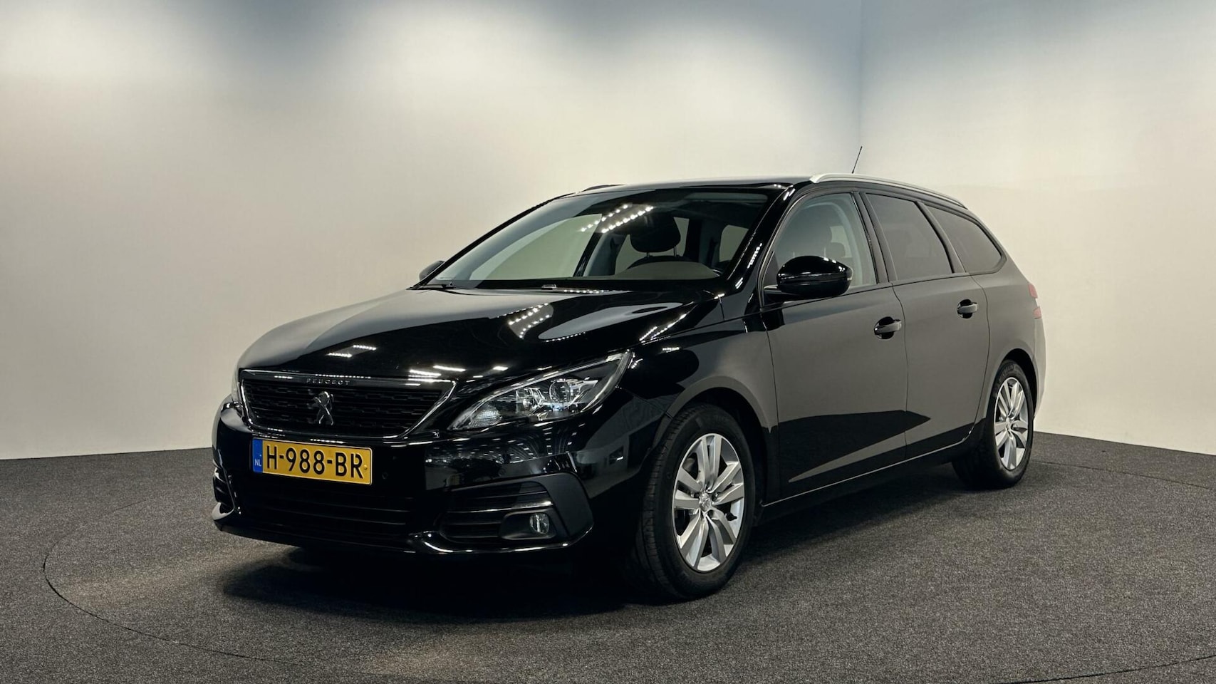 Peugeot 308 SW - 1.2 PureTech Blue Lease Premium PANO TREKHAAK - AutoWereld.nl