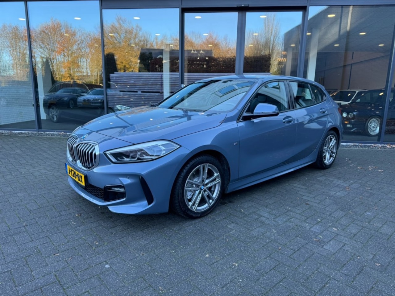 BMW 1-serie - 118i M Sport 118i M-Sport,LED,Half leer,NaviPro,Clima,Stoelverw,Lane Ass.,Cru - AutoWereld.nl