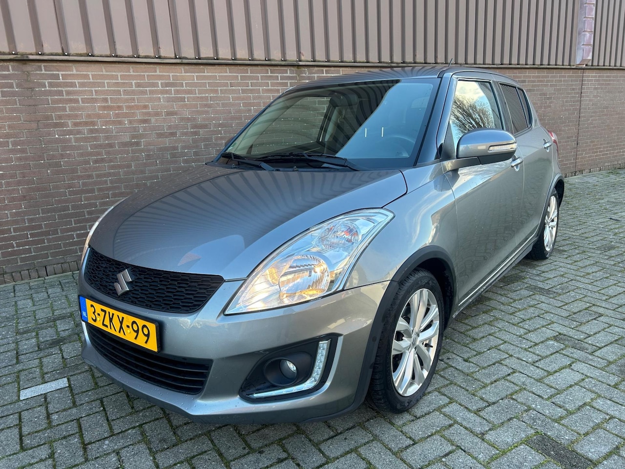 Suzuki Swift - 1.2 Exclusive EASSS 5drs. Clima Stoelverw. Keyless - AutoWereld.nl