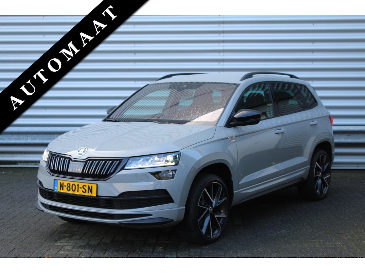 Skoda Karoq - 1.5 TSI 150pk Sportline BusinessDSG7 NL-Auto NAP Clima Cruise Navi Camera Dig. Cockpit El. - AutoWereld.nl