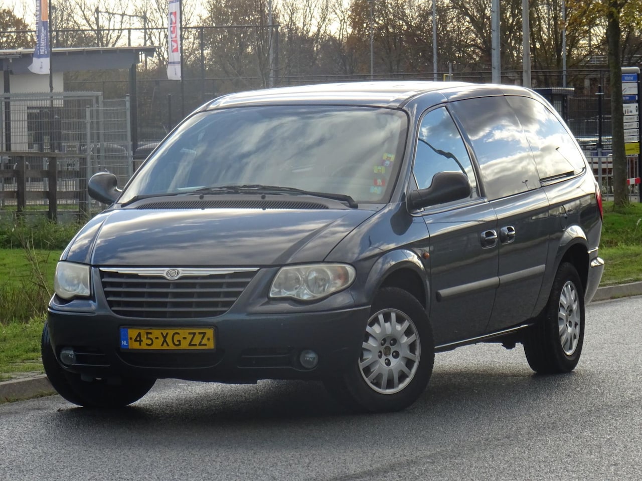 Chrysler Grand Voyager - 3.3i V6 SE AUT. 7P. NAP/NAVI/PDC/APK - AutoWereld.nl