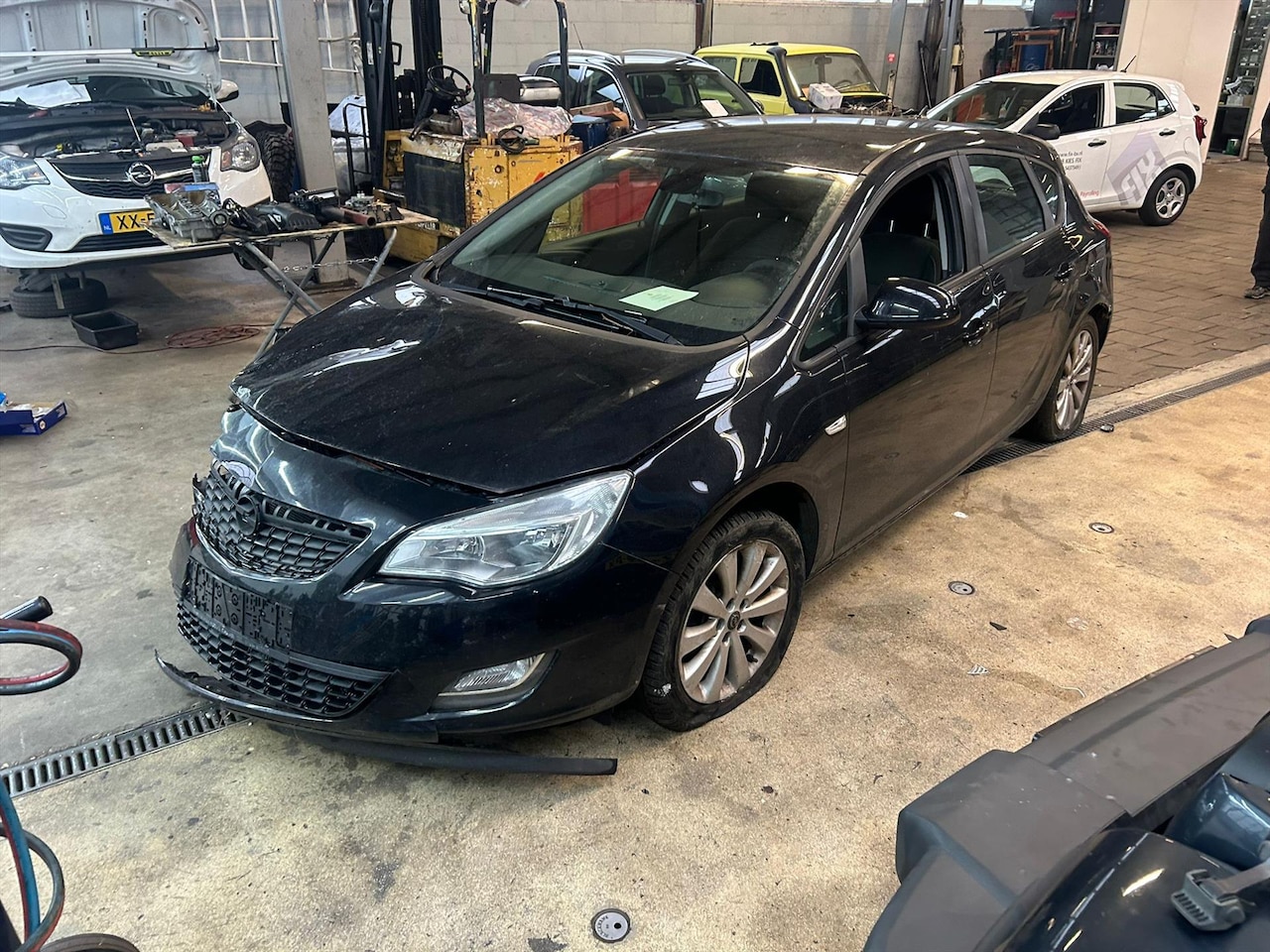 Opel Astra - 1.6 ECOTEC 85KW 5-D Sport rechter schade - AutoWereld.nl