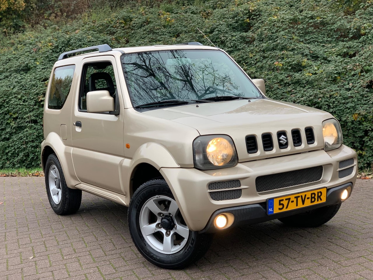 Suzuki Jimny - 1.3 Exclusive 4X4 AWD AIRCO 2007 TOPSTAAT ! - AutoWereld.nl