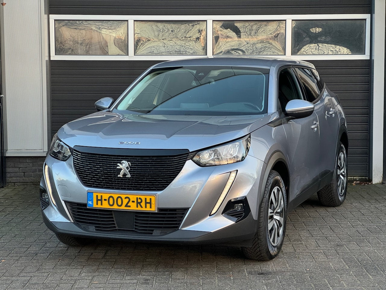 Peugeot 2008 - 1.5 BlueHDi Blue Lease Active Navi, Camera, Stoelverwarming, NAP - AutoWereld.nl