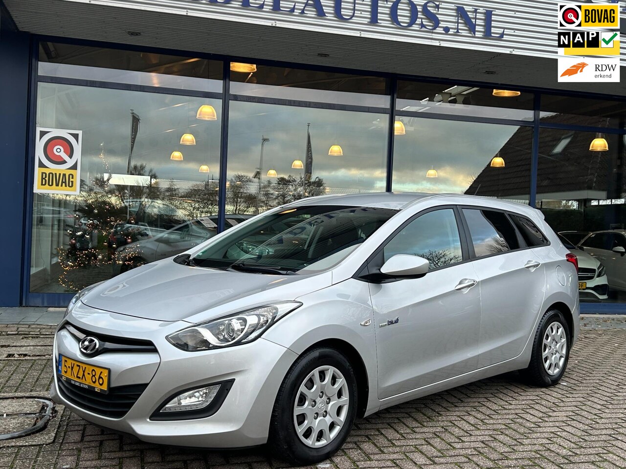 Hyundai i30 Wagon - 1.6 GDI i-Motion Airco Park.Sens Cruise Isofix NAP NL-Auto Dealeronderhouden! - AutoWereld.nl