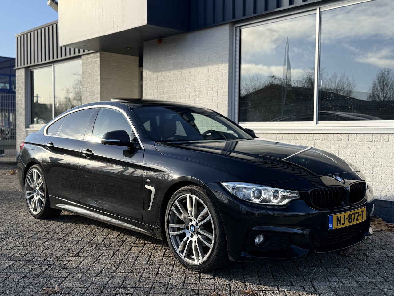 BMW 4-serie Gran Coupé - 420i High Executive Aut. M-Sport Schuif/Kantel dak Leder 19" lichtmetalen velgen - AutoWereld.nl