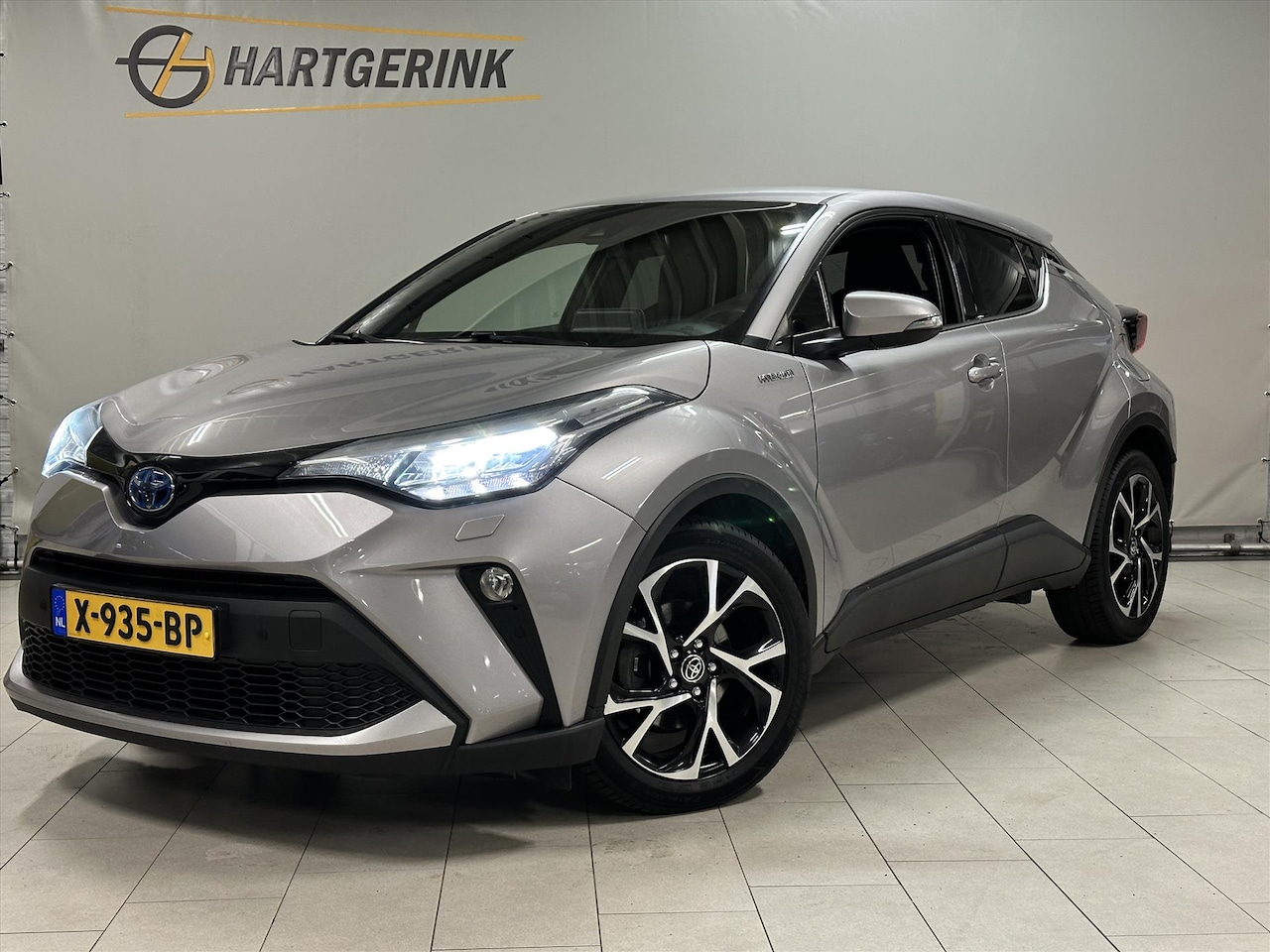 Toyota C-HR - 1.8 Hybrid CVT Business Plus* Airco / Cruise / Camera / PDC / Winterpakket / LMV - AutoWereld.nl