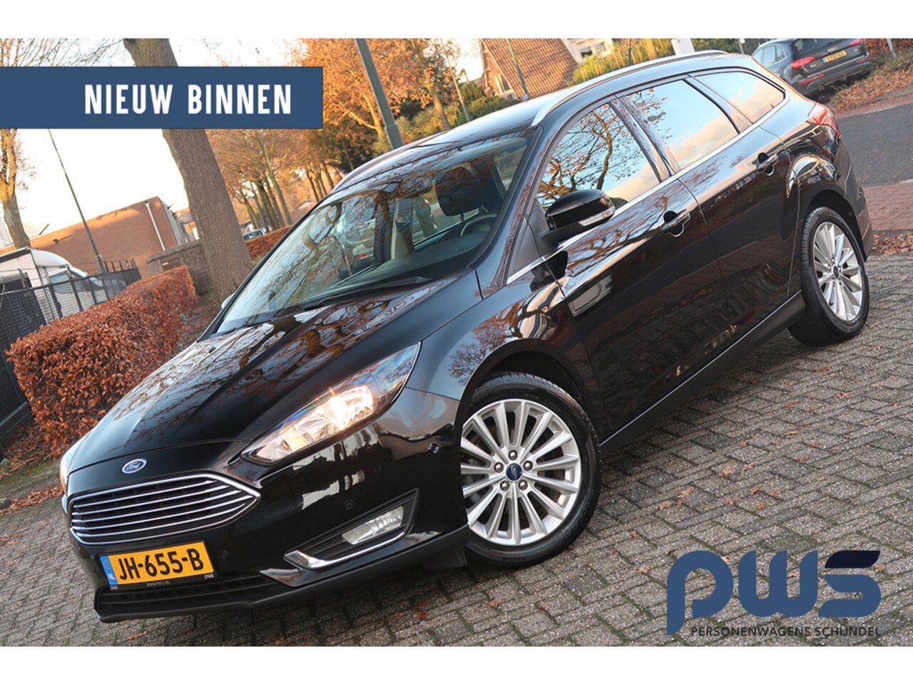 Ford Focus Wagon - 1.0 Titanium 125pk Navi / PDC / Clima / Cruise / Bluetooth / voorruit verw. / NL auto! - AutoWereld.nl