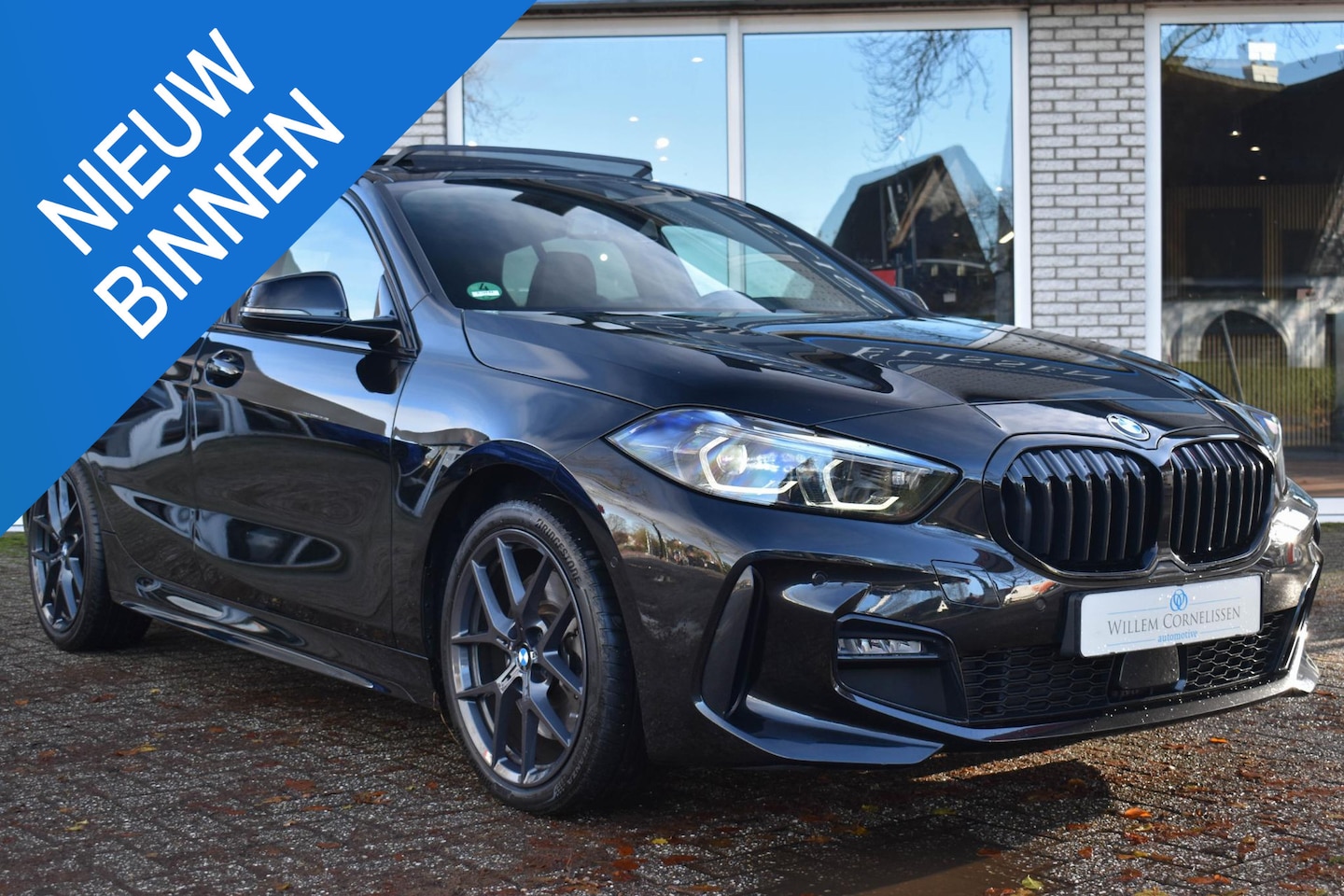 BMW 1-serie - 120i Business Edition Plus M-Sport Pano Camera - AutoWereld.nl