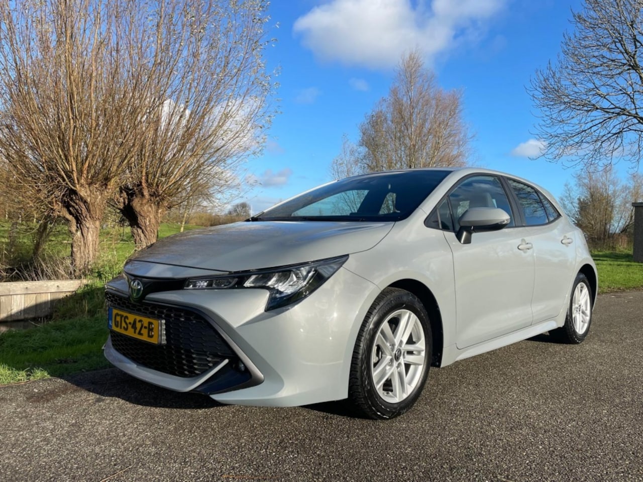 Toyota Corolla - 1.8 Hybrid Active all-in prijs/navigatie/camera/Car-play/10 jaar - AutoWereld.nl