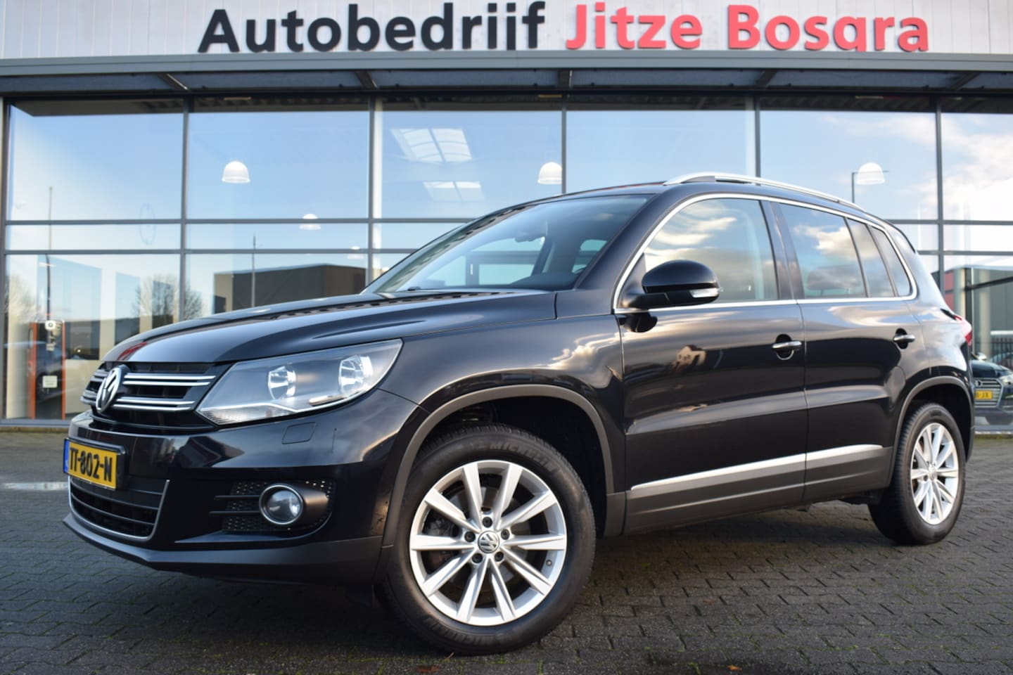 Volkswagen Tiguan - 1.4 TSi Automaat Sport&Style Bruin Leder | Panoramadak | Full Map Navi | Stoelverwarming | - AutoWereld.nl