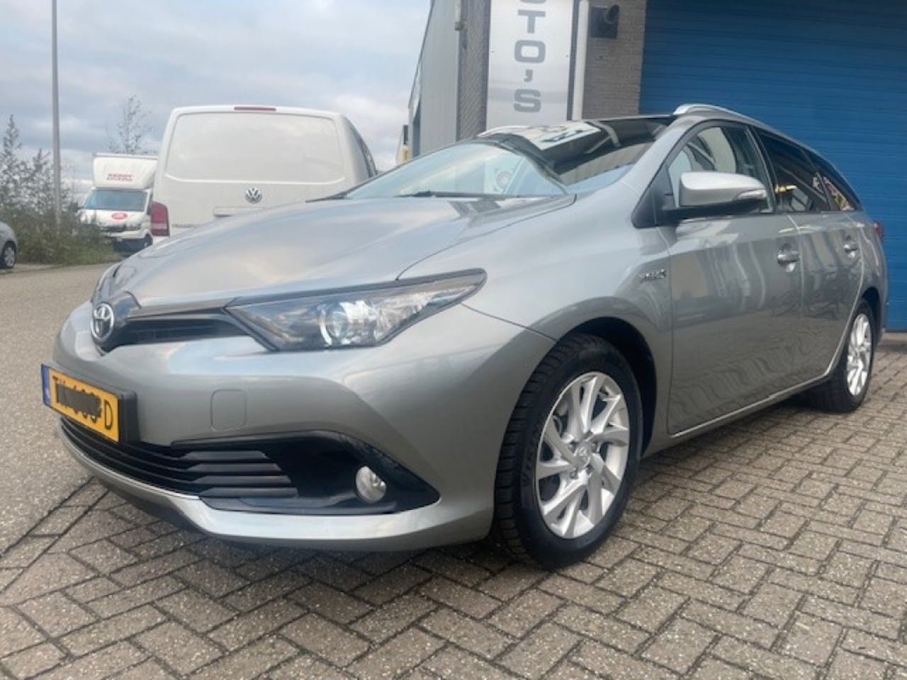 Toyota Auris - 1.8 HYBR. DYNAMIC - AutoWereld.nl