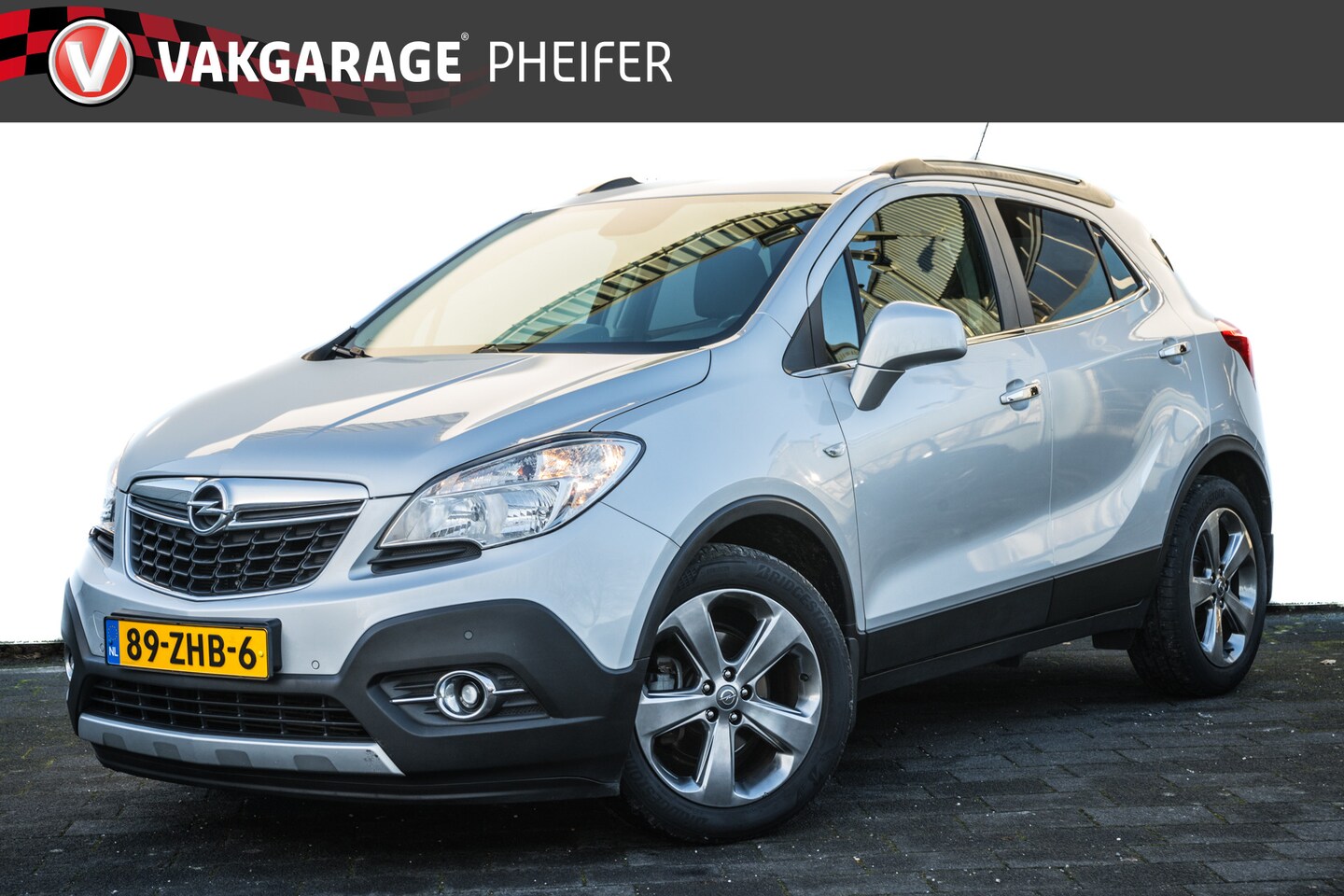 Opel Mokka - 1.4 T 140pk Cosmo 4x4 Sportstoelen/ Stuur+stoelverwarming/ Trekhaak/ Cruise control - AutoWereld.nl