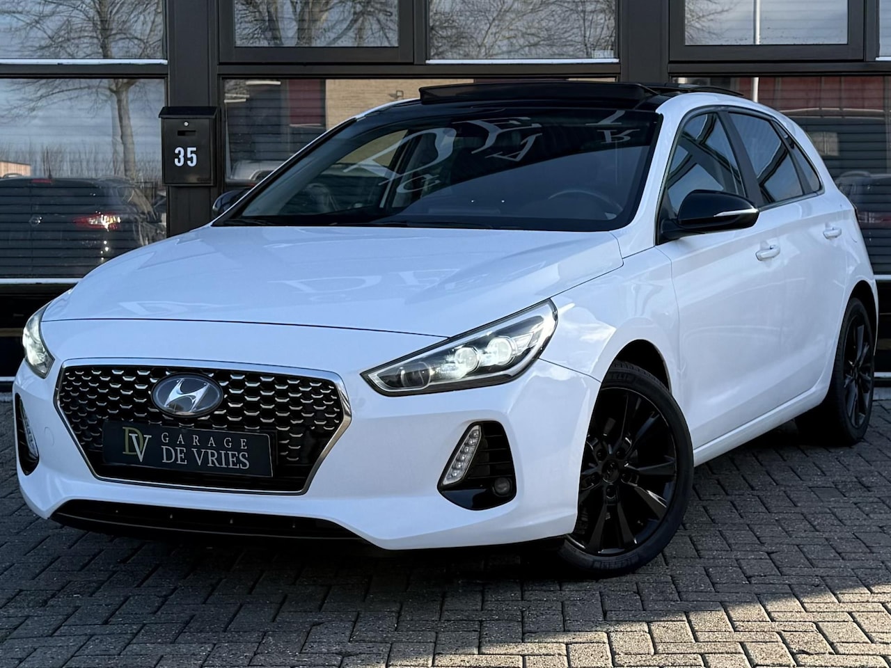 Hyundai i30 - 1.0 T-GDI Premium Panoramadak Camera Garantie - AutoWereld.nl