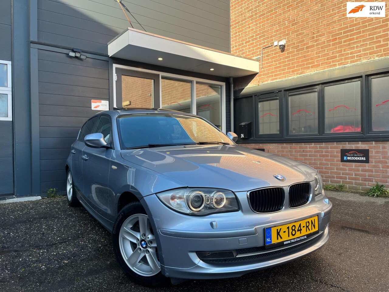 BMW 1-serie - 116i High Executive|PDC|SCHUIFDAK|NAVI|XENON|APK - AutoWereld.nl