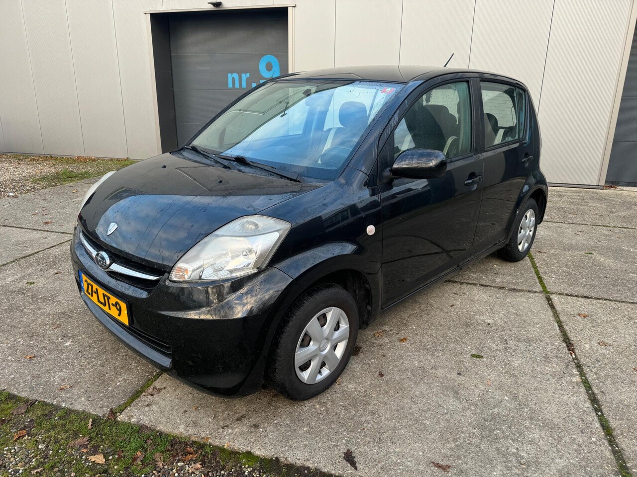 Subaru Justy - 1.0 Black & White - AutoWereld.nl