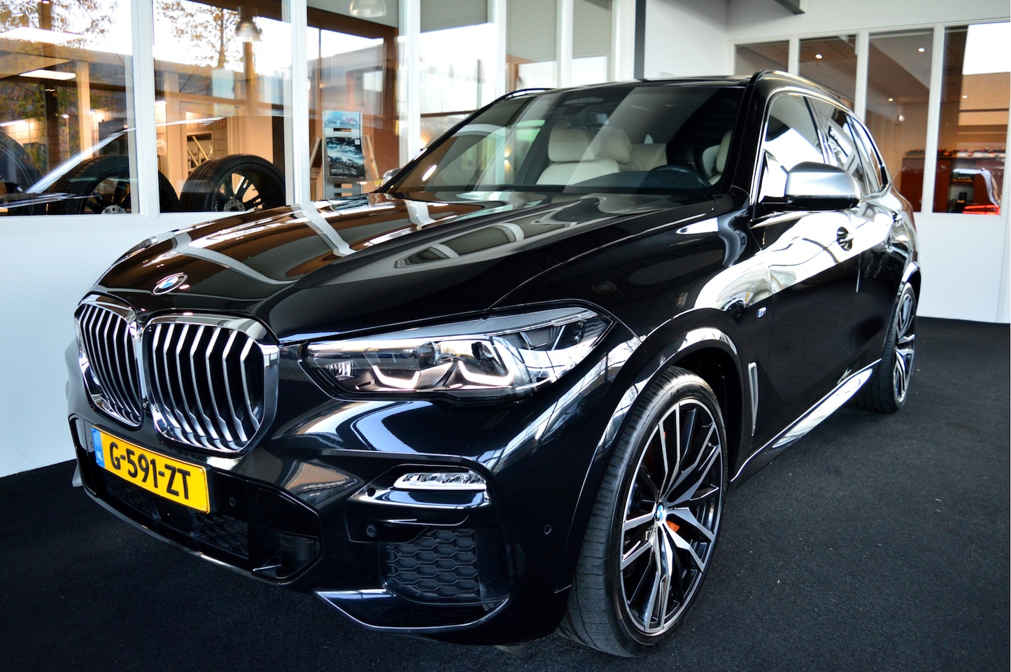 BMW X5 - xDrive 40i M-Sportedition | 3e zitrij 7persoons ! - AutoWereld.nl