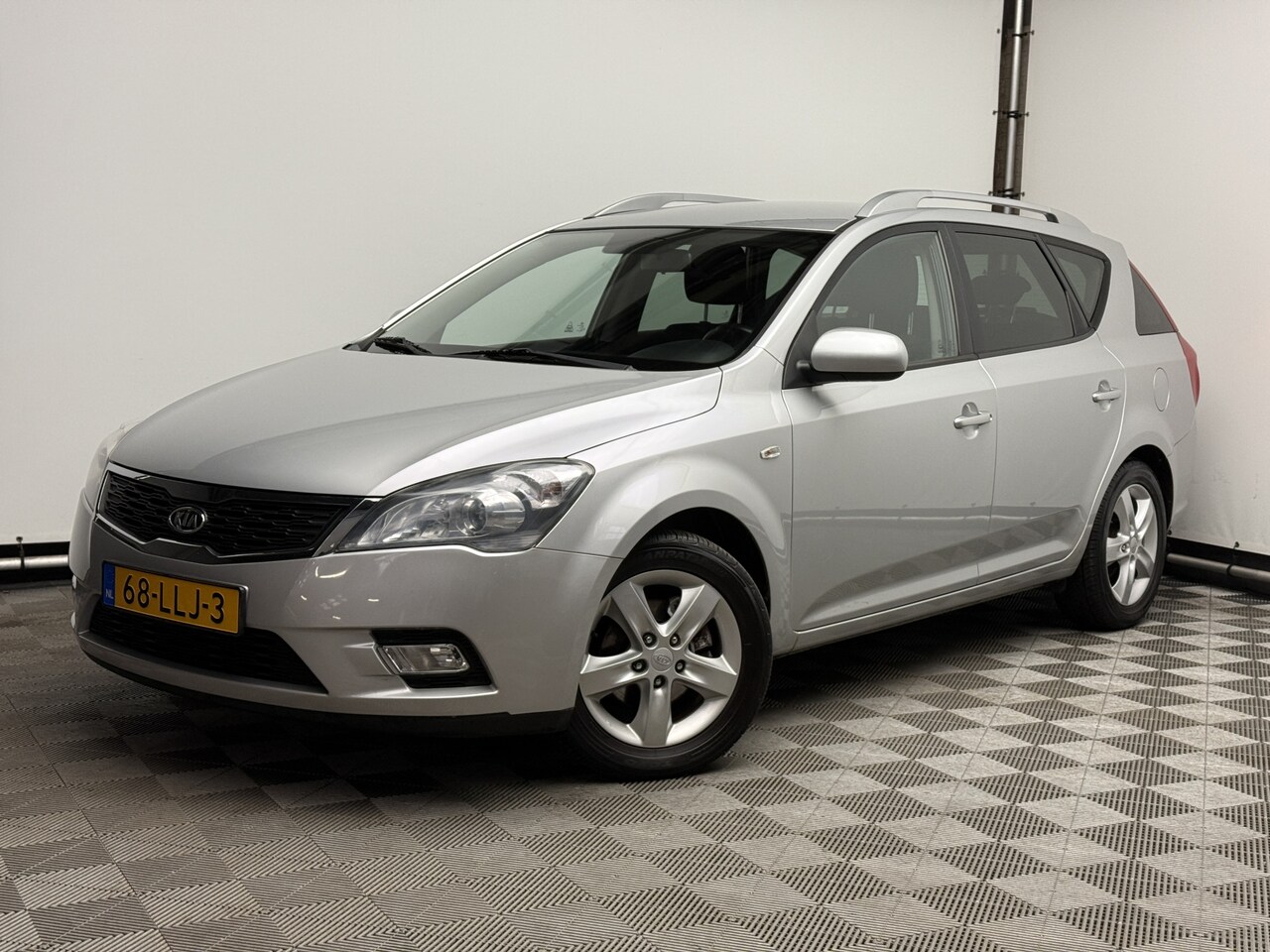 Kia Cee'd - 1.4 CVVT X-ecutive Navi Airco Trekhaak Cruise NL Auto - AutoWereld.nl