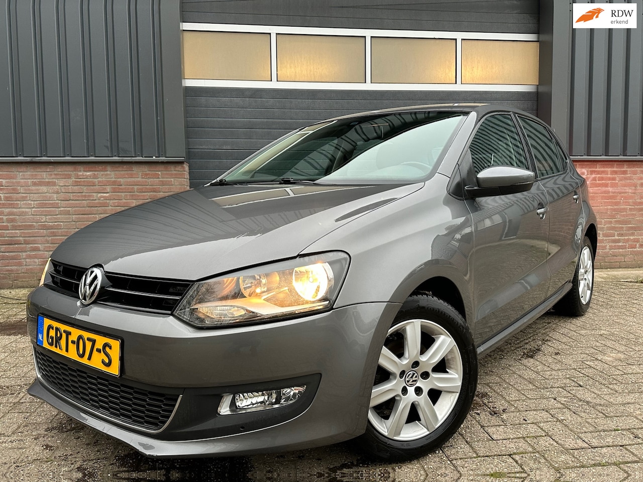 Volkswagen Polo - 1.2 BlueMotion Comfortline 5 deur PDC cruise - AutoWereld.nl