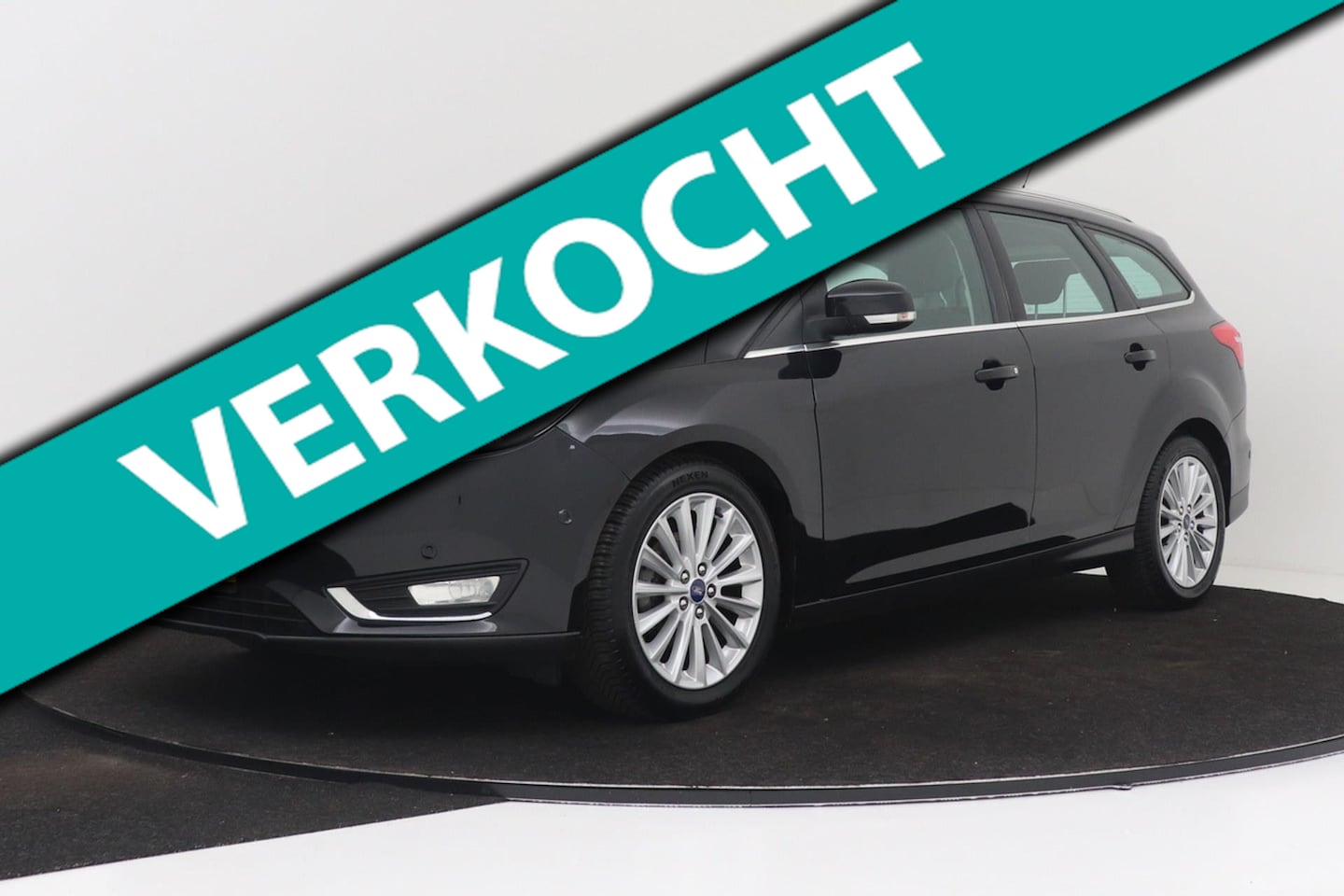 Ford Focus Wagon - 1.0 Titanium Edition 125 pk | Trekhaak | Navigatie | Parkeersensoren | Keyless | Climate C - AutoWereld.nl