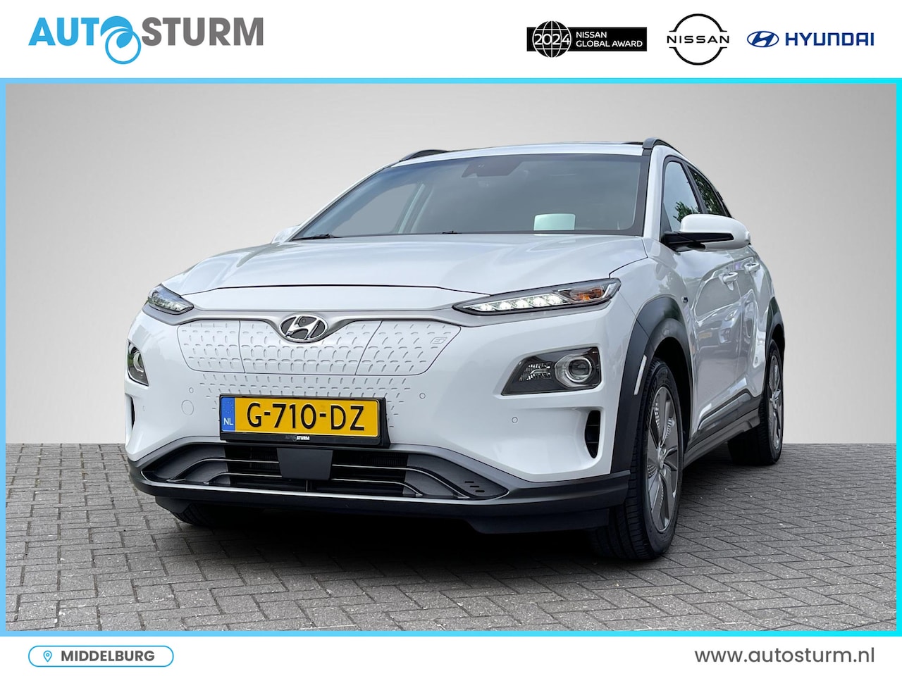 Hyundai Kona Electric - EV Premium 64 kWh Sky | Head-Up Display | Stuur- + Stoelverwarming | Leder | Schuif-/Kante - AutoWereld.nl