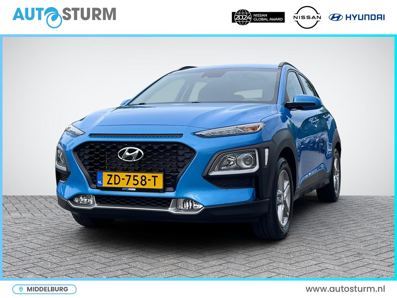 Hyundai Kona - 1.0 T-GDI Comfort | Navigatie | Camera | Apple Carplay/Android Auto | Park. Sensor | Premi - AutoWereld.nl