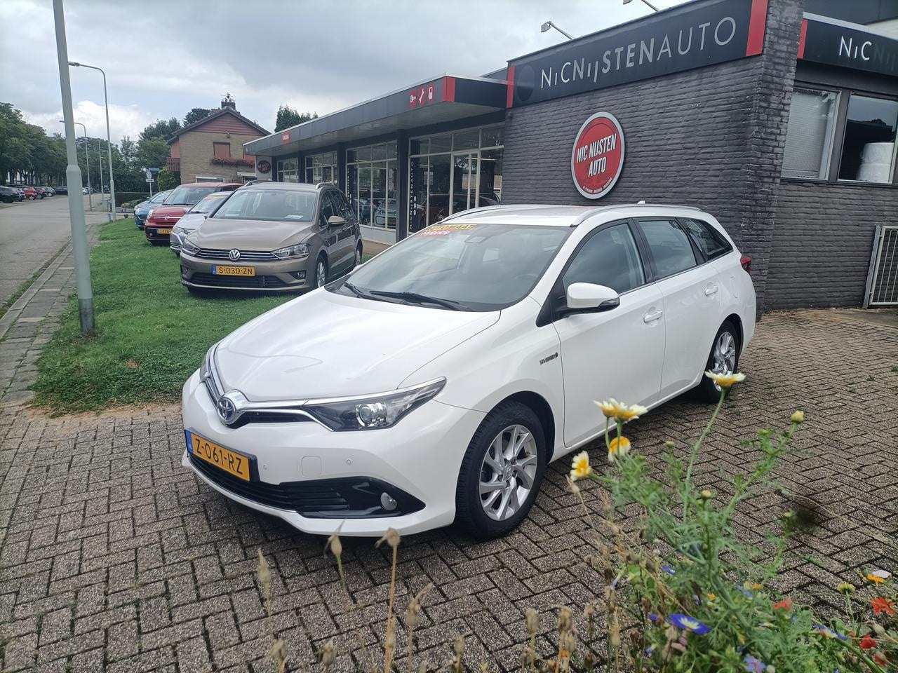 Toyota Auris Touring Sports - 1.8 Hybrid Sports,Navi,Camera,Cruise - AutoWereld.nl