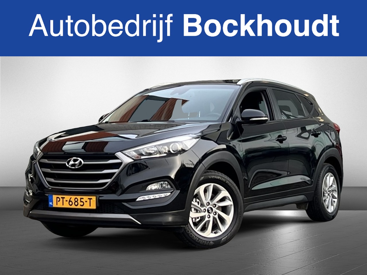 Hyundai Tucson - 1.6 T-GDi Comf. 4WD | Navi | Camera | Trekhaak - AutoWereld.nl