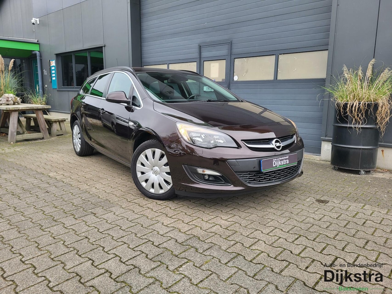 Opel Astra Sports Tourer - 1.4 Turbo Sport + Airco/ Trekhaak/ Stoelverwarming!! - AutoWereld.nl