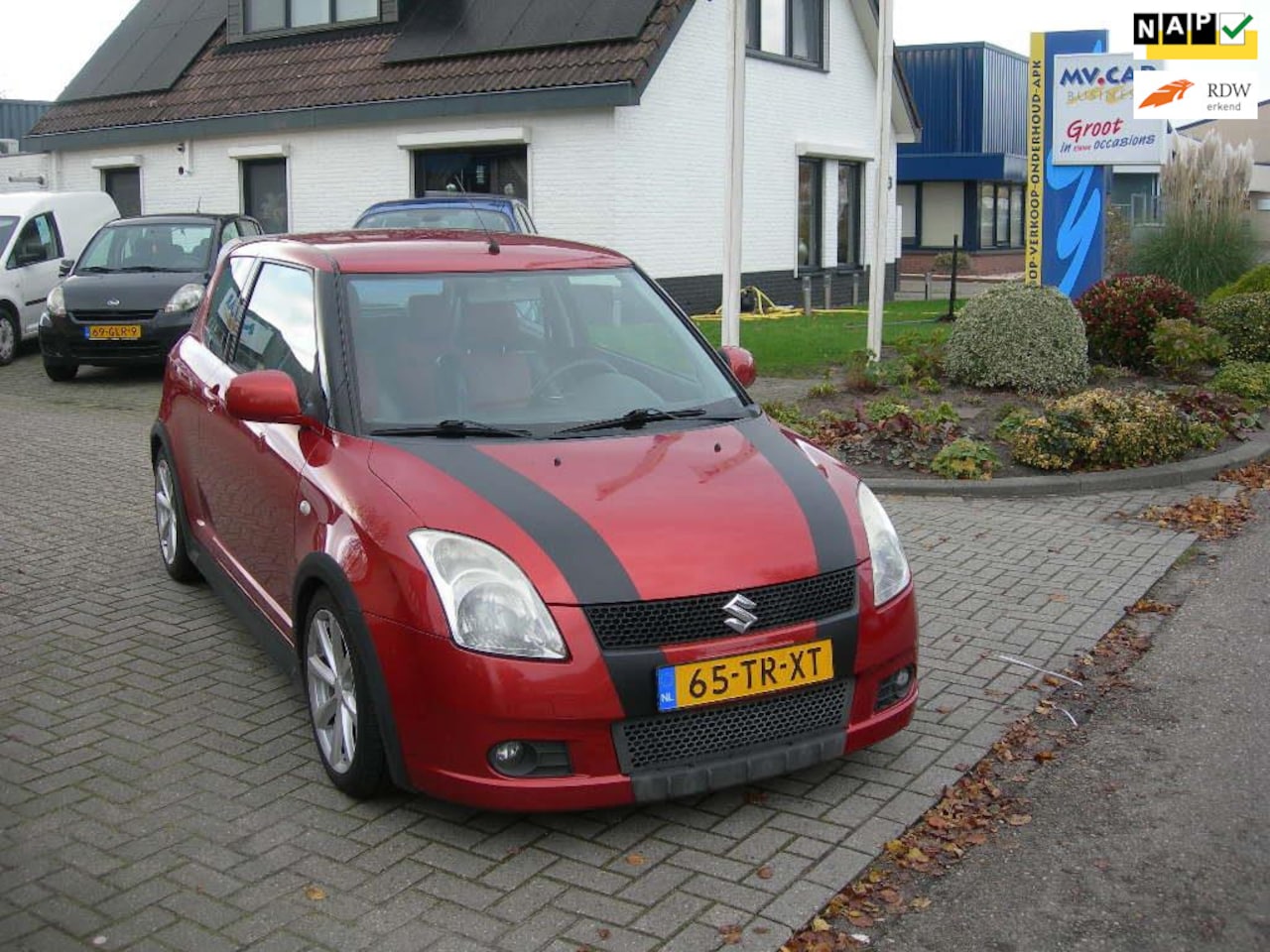 Suzuki Swift - 1.5 Exclusive met airco en 2 tone lederen interieur - AutoWereld.nl