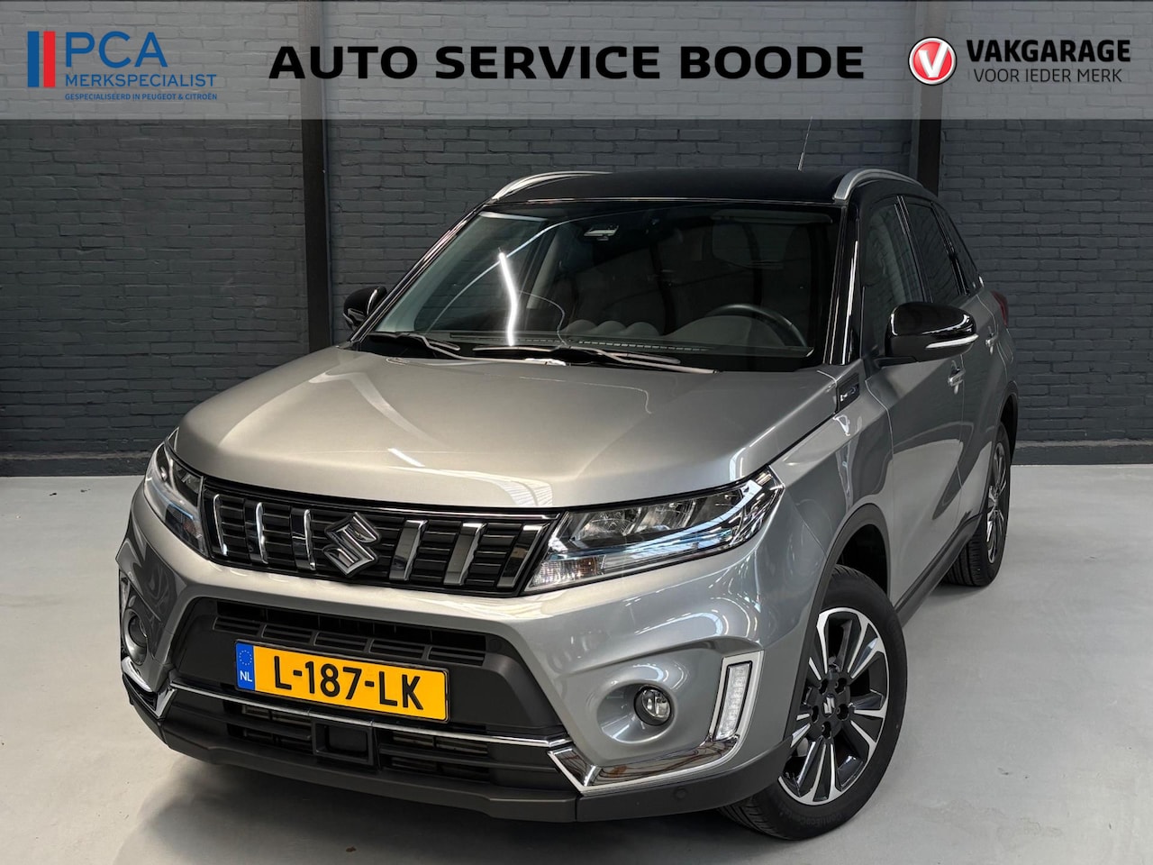 Suzuki Vitara - 1.4 Boosterjet (129pk) Style Smart Hybrid - trekhaak - two tone - AutoWereld.nl