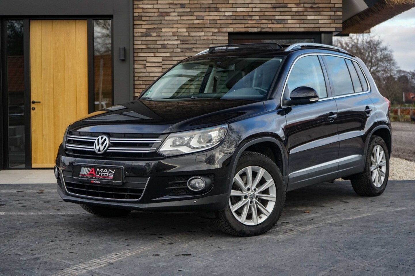 Volkswagen Tiguan - Tiguan 1.4 TSI BMT Sport & Style - AutoWereld.nl