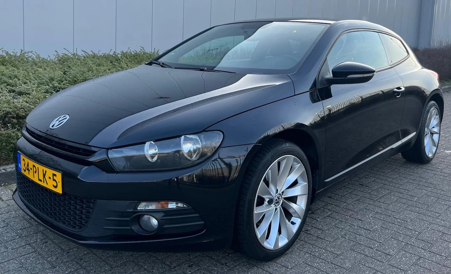 Volkswagen Scirocco - 1.4 TSI 160pk Highline Plus 2011 DSG AUTOMAAT NAP - AutoWereld.nl