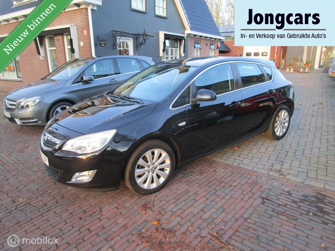 Opel Astra - 1.4 Turbo Cosmo 2011 - AutoWereld.nl