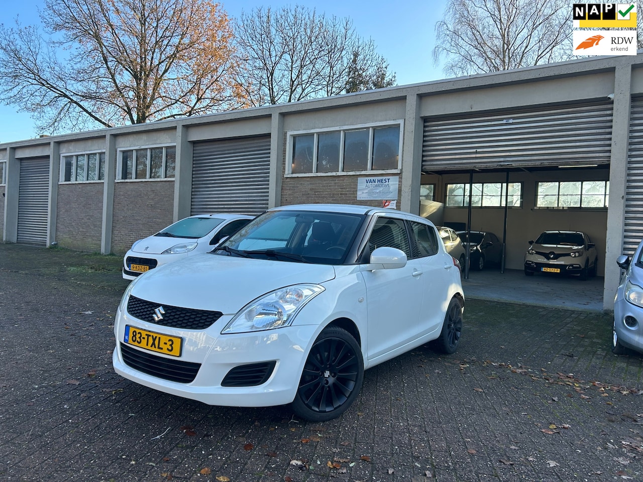 Suzuki Swift - 1.2 Comfort EASSS Airco/Stoelverwarming/Lichtmetalen velgen! NAP! - AutoWereld.nl