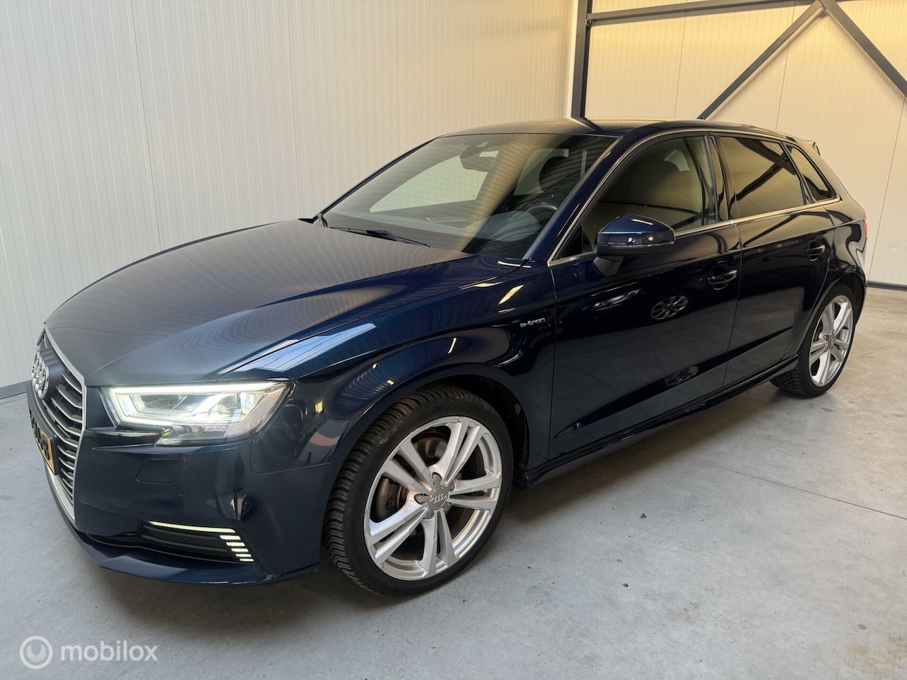 Audi A3 Sportback - 1.4 e-tron S-line - AutoWereld.nl