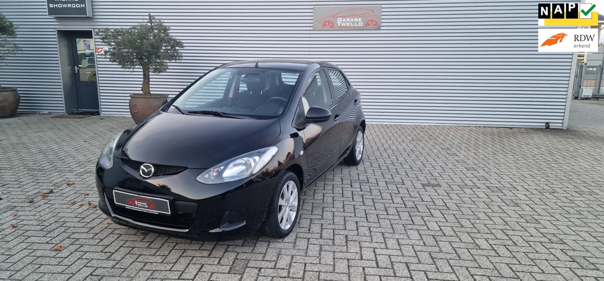 Mazda 2 - 1.3 ,5 deurs,airco,cv vergrendeling,cd radio,elek ramen,nw model,onderhoud aanwezig,in top - AutoWereld.nl