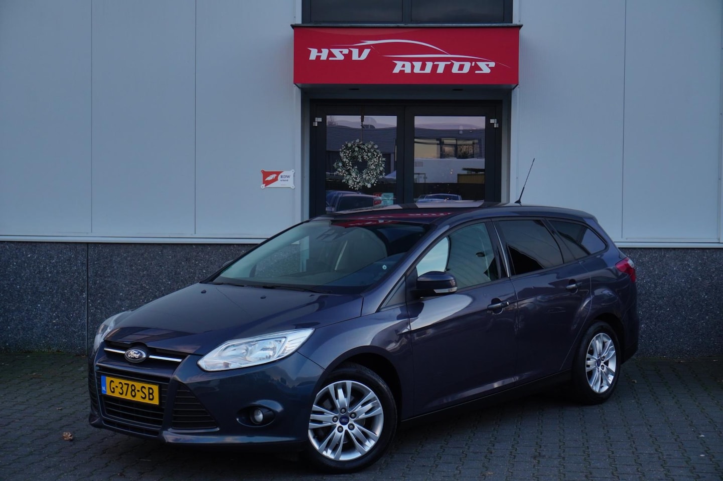 Ford Focus Wagon - 1.0 EcoBoost Titanium airco LM navi - AutoWereld.nl