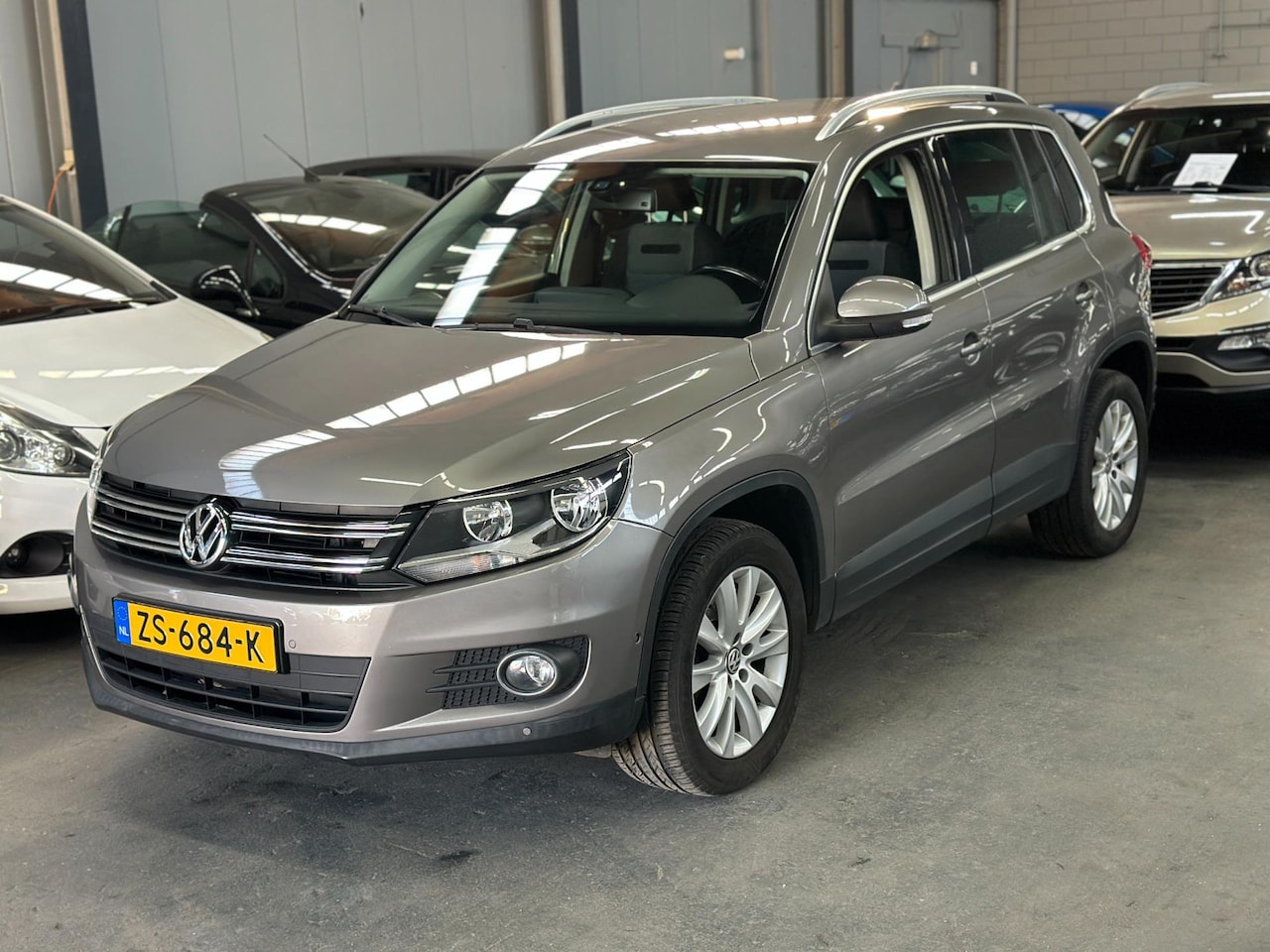 Volkswagen Tiguan - 2.0 TSI Track&Field 4Motion Automaat PDC APK NAP - AutoWereld.nl