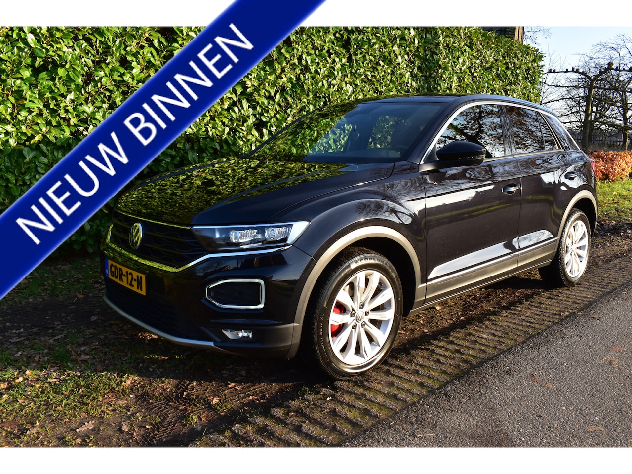 Volkswagen T-Roc - 2.0 TSI 4Motion 190PK Sport Business R AUT. 64DKM! - AutoWereld.nl