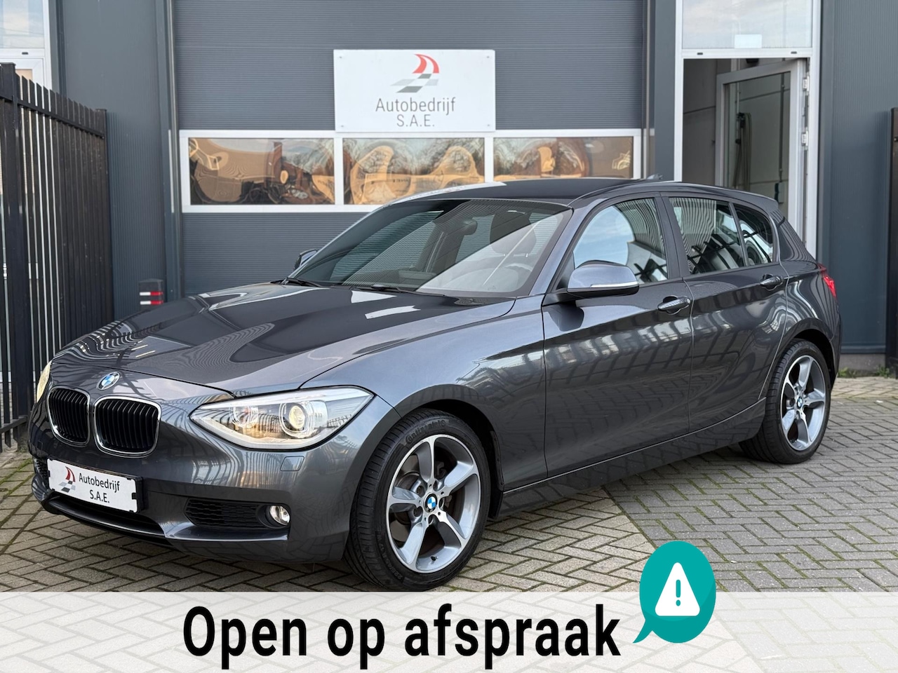 BMW 1-serie - 118i Automaat XENON NAVI CRUISE PDC !! - AutoWereld.nl