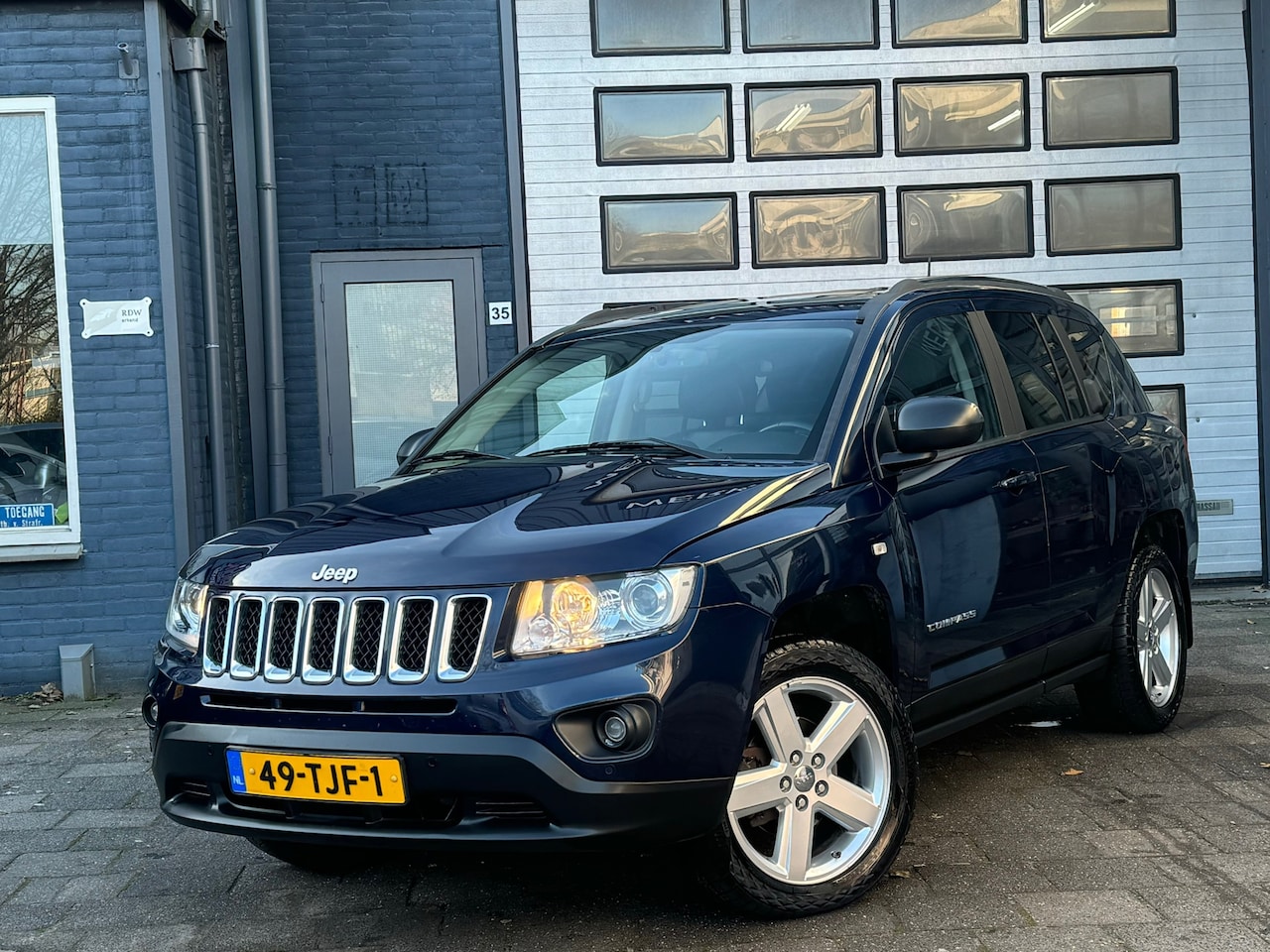 Jeep Compass - 2.4 Limited 4WD | Airco | Cruise | Schuifdak | Automaat | N.A.P - AutoWereld.nl