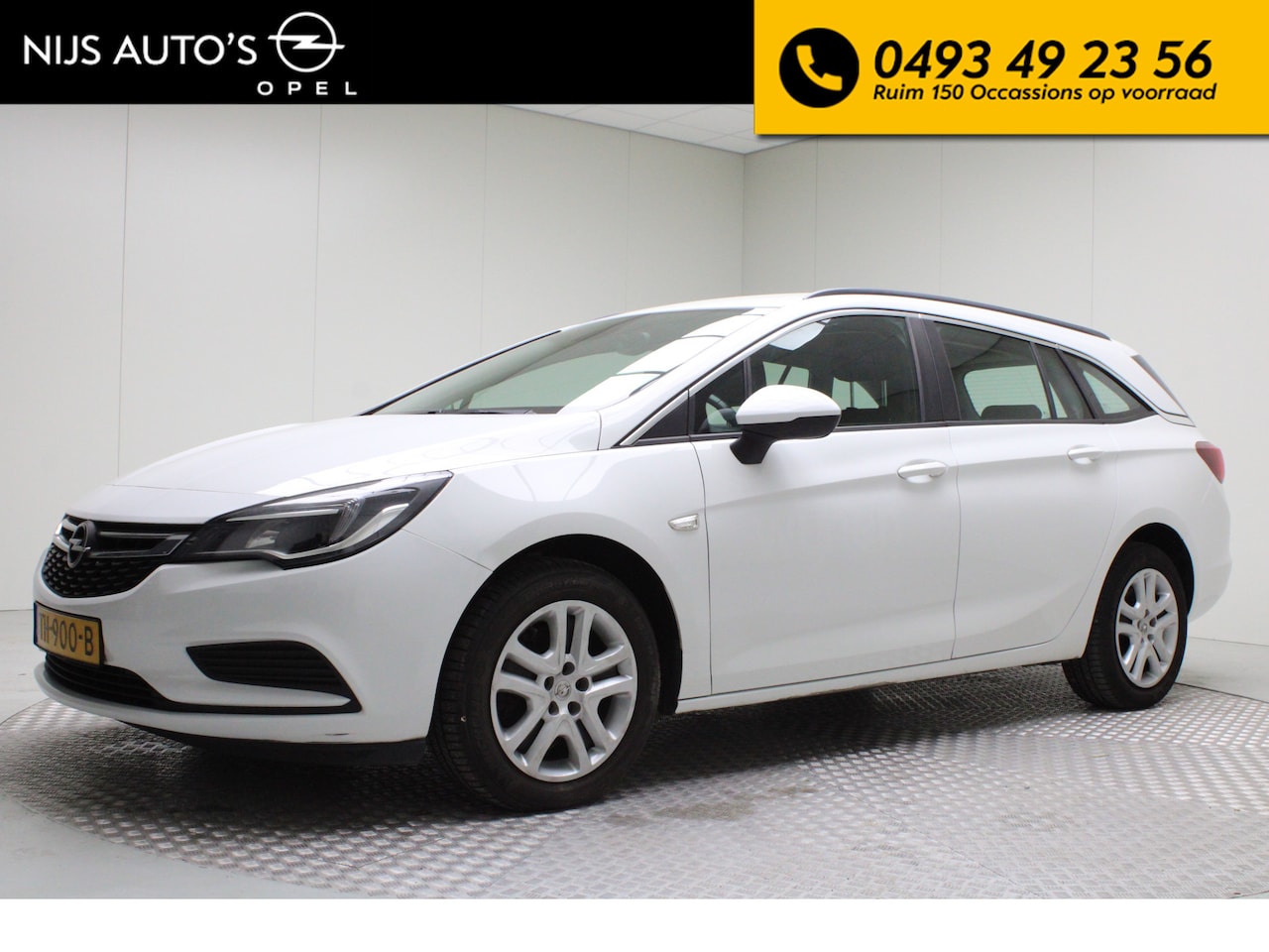 Opel Astra Sports Tourer - 1.6 CDTI Business+ | trekhaak | airco | navigatie | carplay | pdc achter - AutoWereld.nl