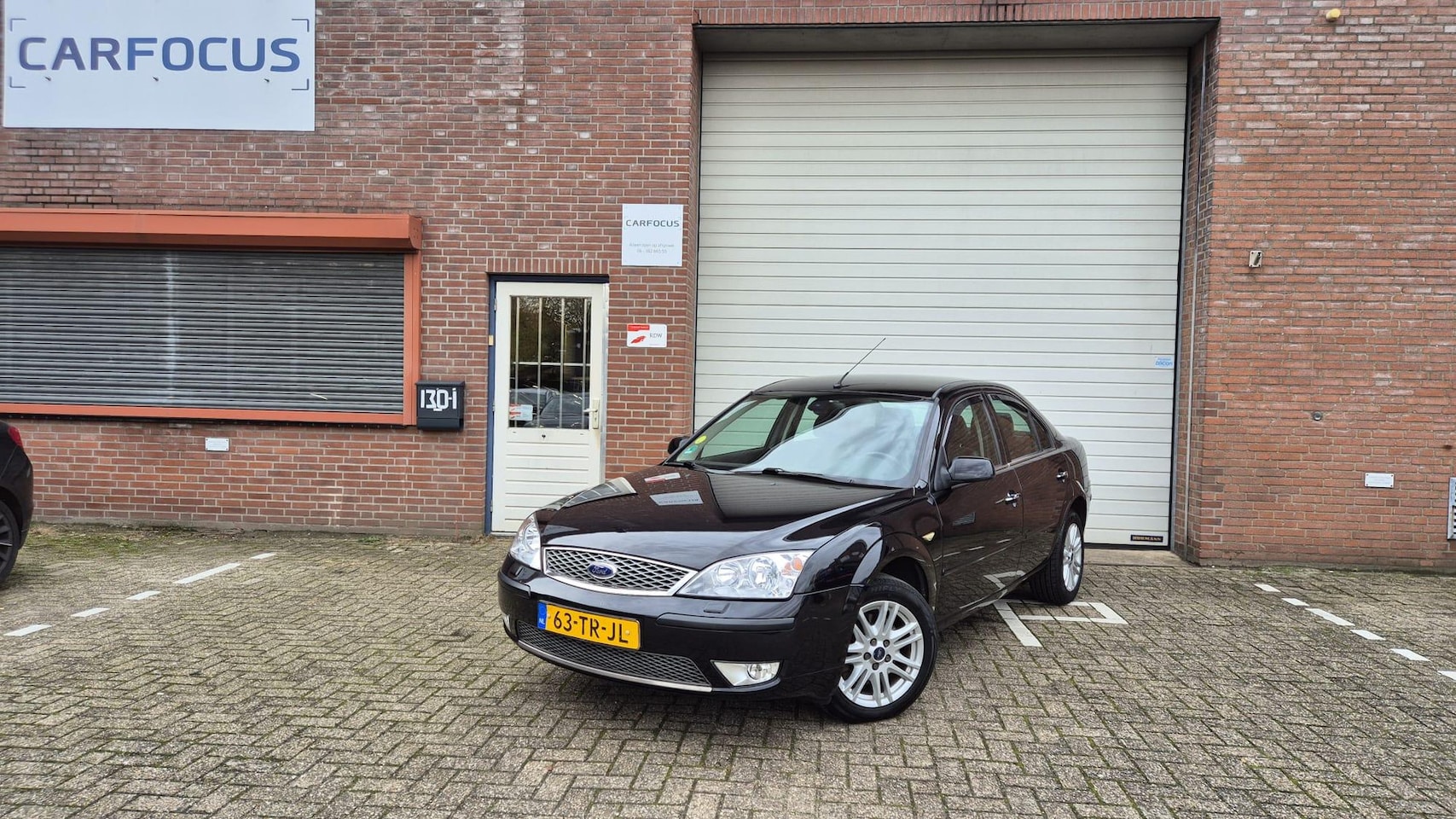 Ford Mondeo - 1.8-16V Platinum Leder 1e eigenaar Navi PDC Airco NAP Cruise Trekhaak 11-25 APK - AutoWereld.nl