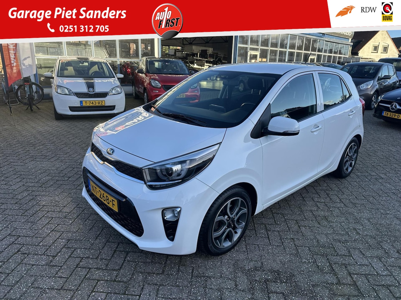 Kia Picanto - 1.0 CVVT First Edition I Clima I Camera I Cruise I Navi - AutoWereld.nl